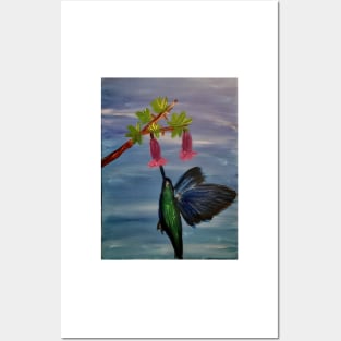 Hummingbird about to feed on nectar Posters and Art